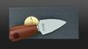 
                    Caminada Parmesan knife with the logo of top chef Andreas Caminada