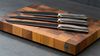 
                    Caminada cutting board walnut wood with knifes from the Caminada ash wood series