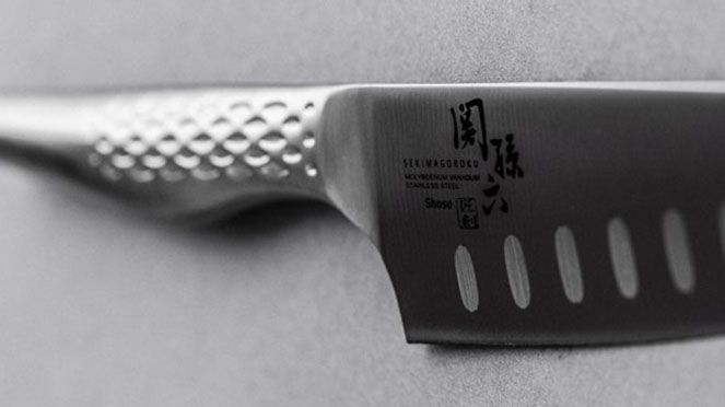 
                    Shoso Santoku hollow ground detail