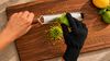 
                    The triangle protective glove protects against sharp graters and knives alike